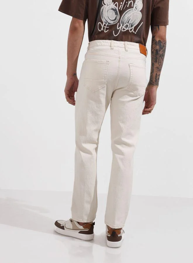 The Indian Garage Co  Men Slim Fit Solid Scoop Pocket Mid-Rise Jeans for Men | Best Price UAE